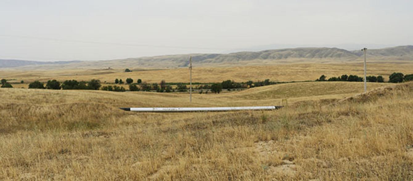 gas pipeline in grassy field