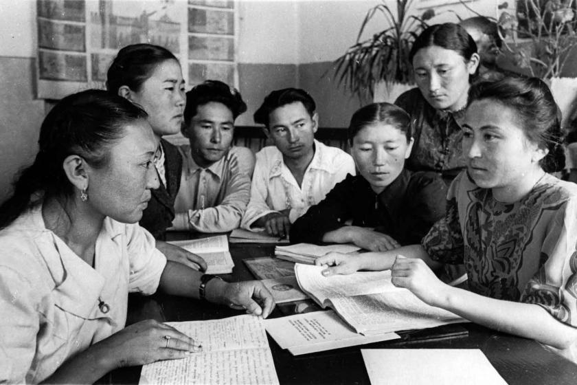 Female instructor with students at Frunze Pedagogical Institute in Kirgiziia