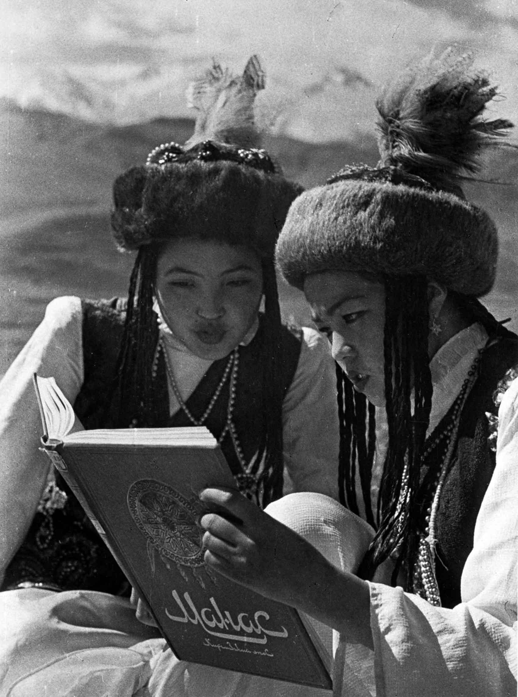 Kirghiz girls reading the national epic "Manas"