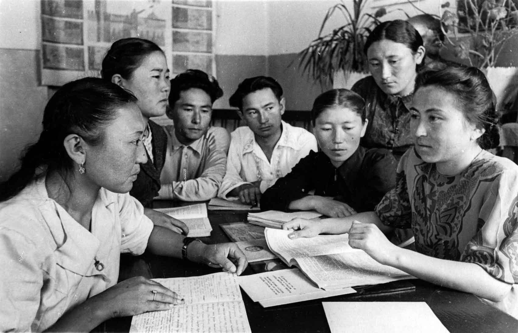 Female instructor with students at Frunze Pedagogical Institute in Kirgiziia