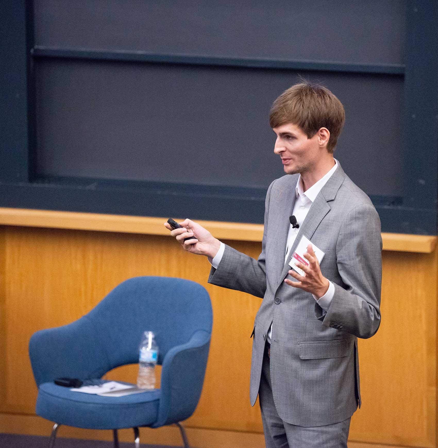 Arvid Bell standing in lecture hall