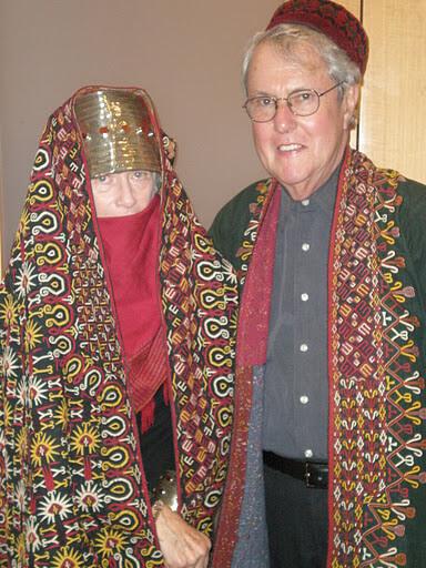 Ambassador Simons and his wife wear colorful traditional Turkmen attire