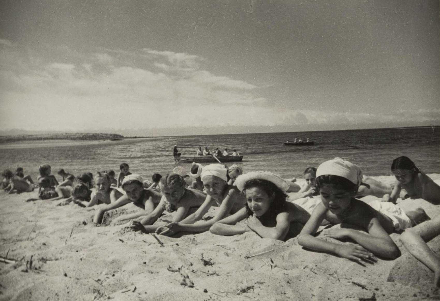 Girls lying on the beach at Issyk-kul pioneer camp