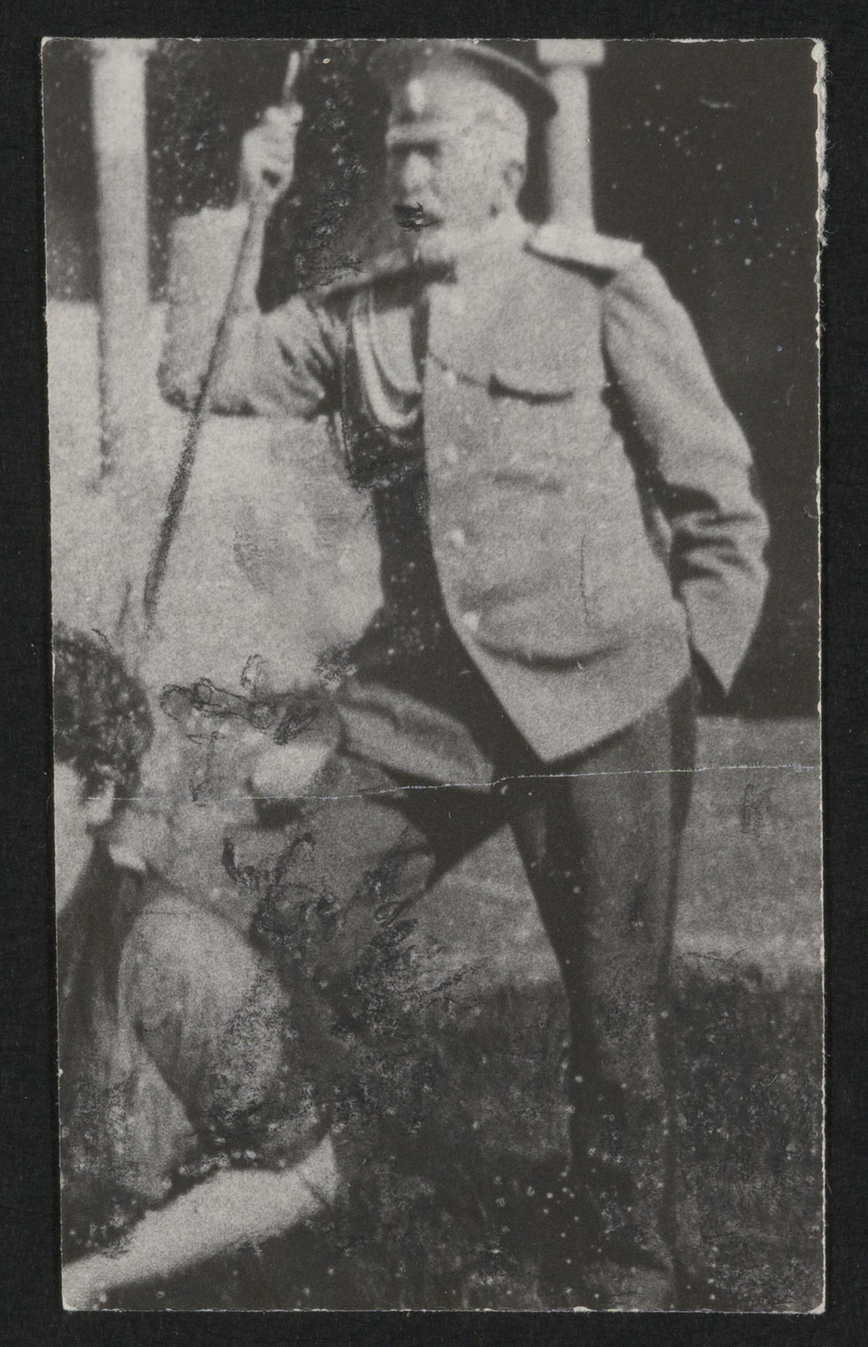 Black and white photo of a man in a military uniform