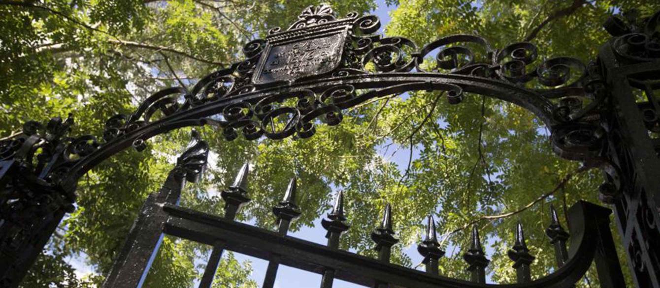 Wrought iron gate with Harvard shield