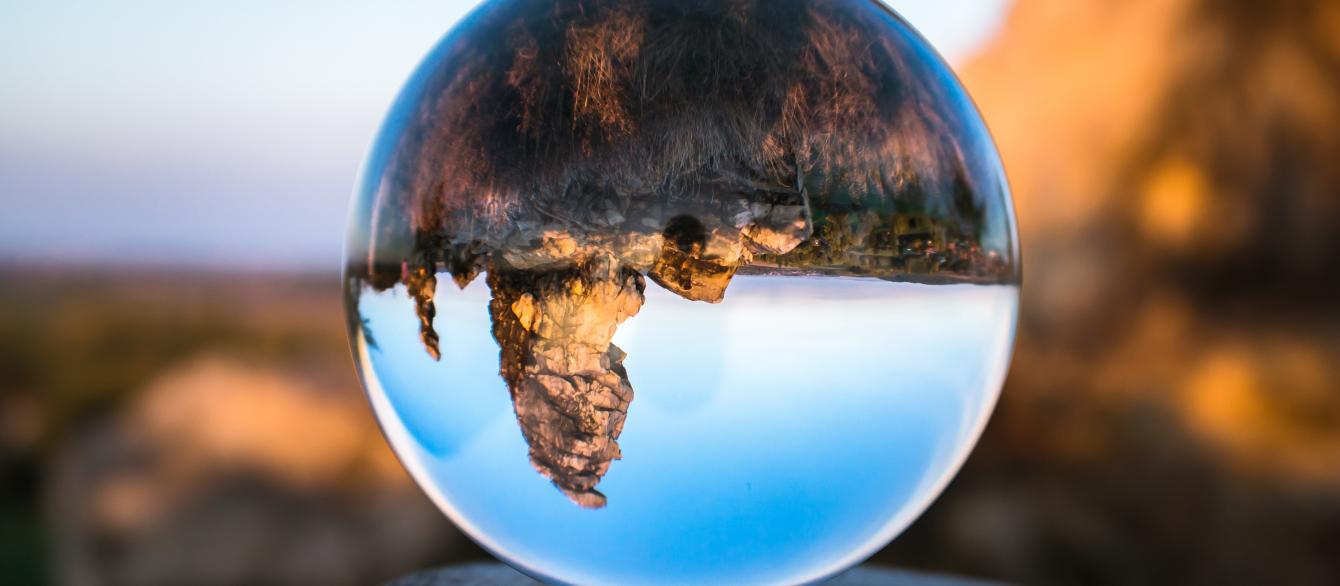 glass sphere with landscape reflection