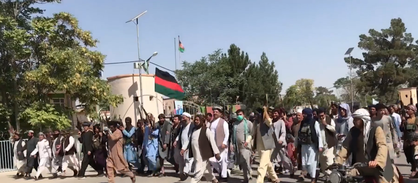 Armed locals protest in support of the Afghan government in Jowzjan Province during the 2021 Taliban offensive.