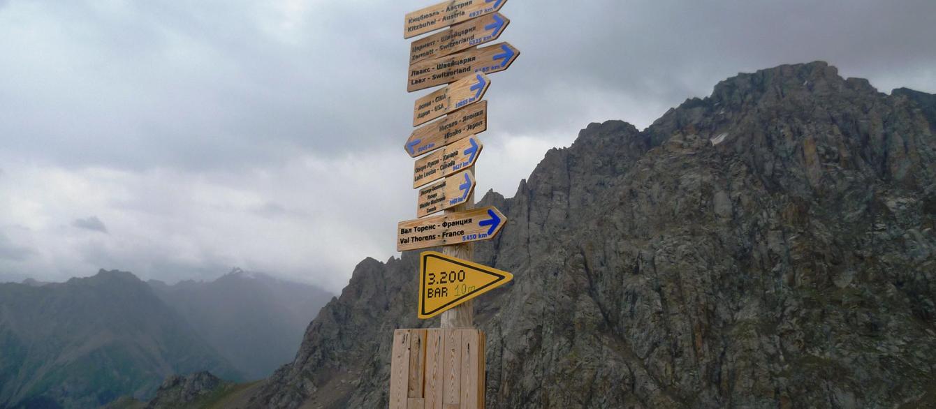 Kazachstan road sign with the mountain in the background