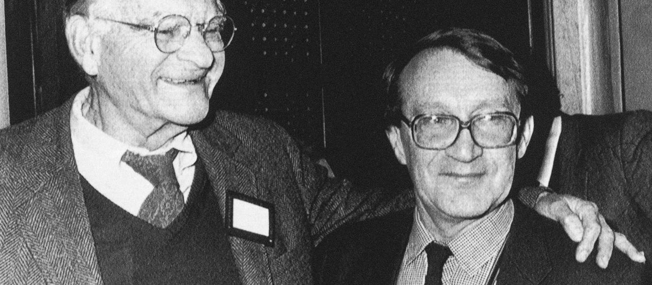 Victor F. Weisskopf, left, smiles beside Roald Segdeev, right.
