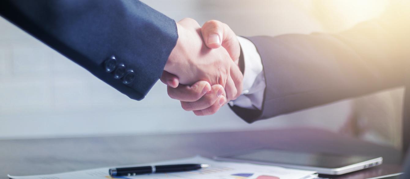 Business deal handshake