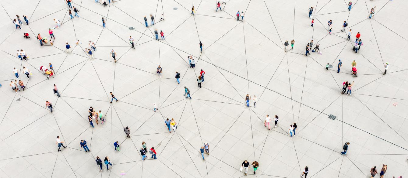 Aerial view of crowd connected by lines stock photo
