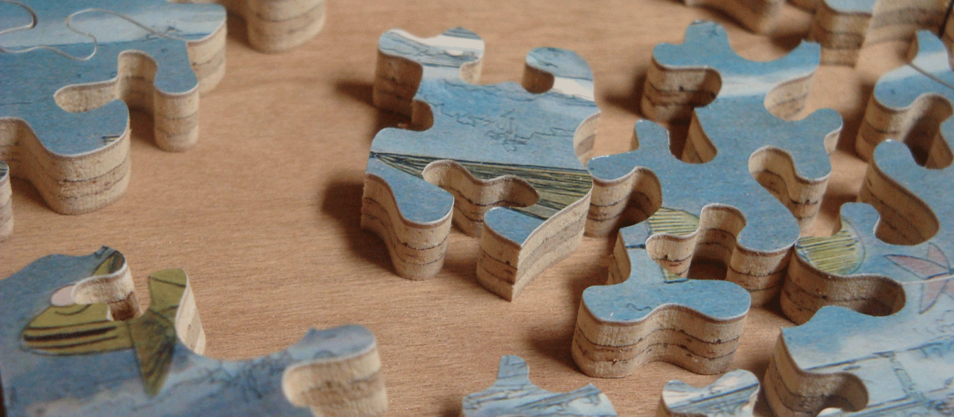 close up of handcut jigsaw puzzle