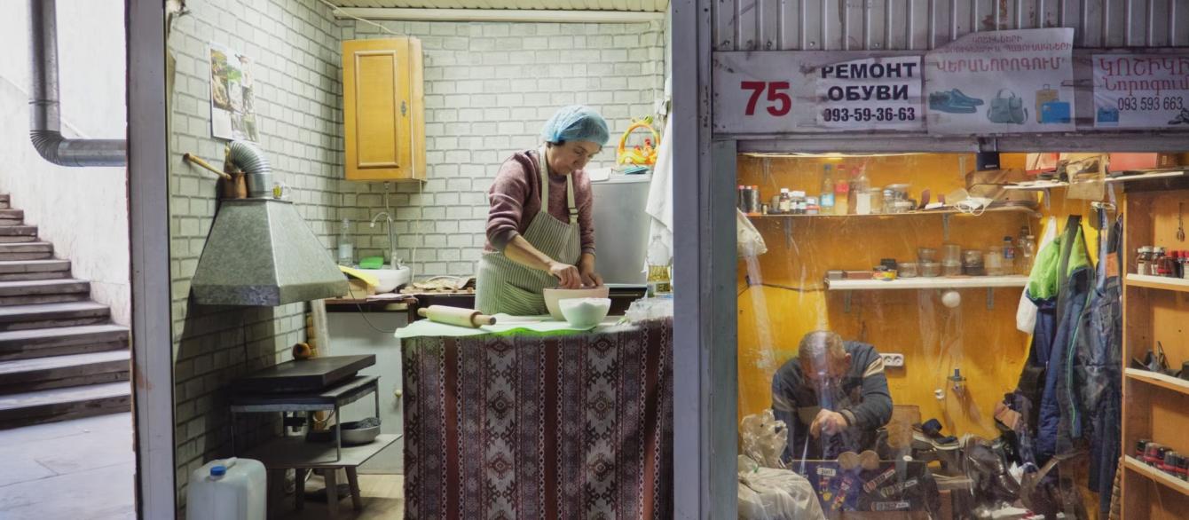 A refugee from Nagorno-Karabakh makes bread in Armenia.