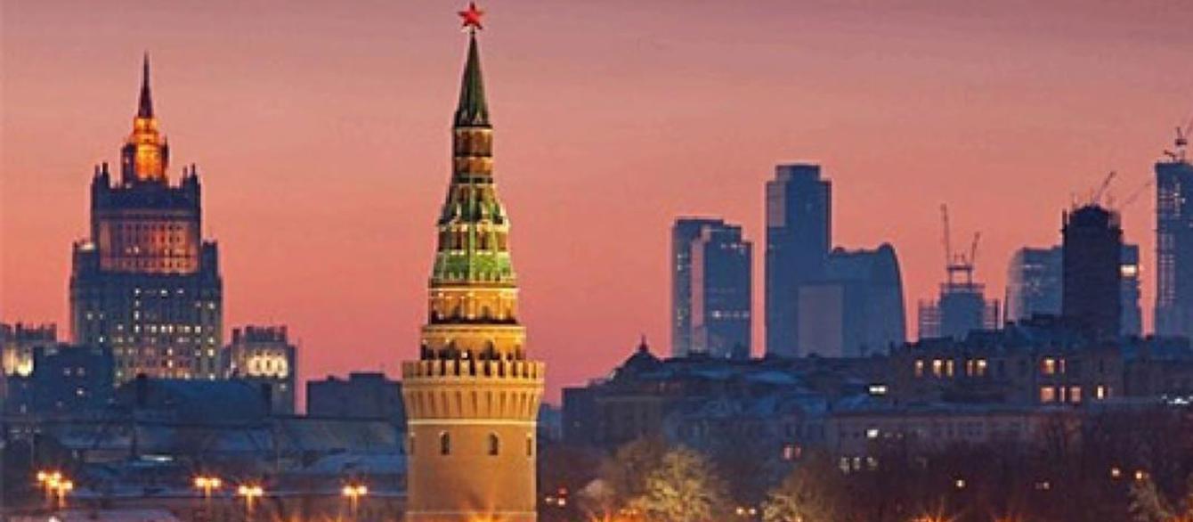 Kremlin tower in the background of the red-pink sky