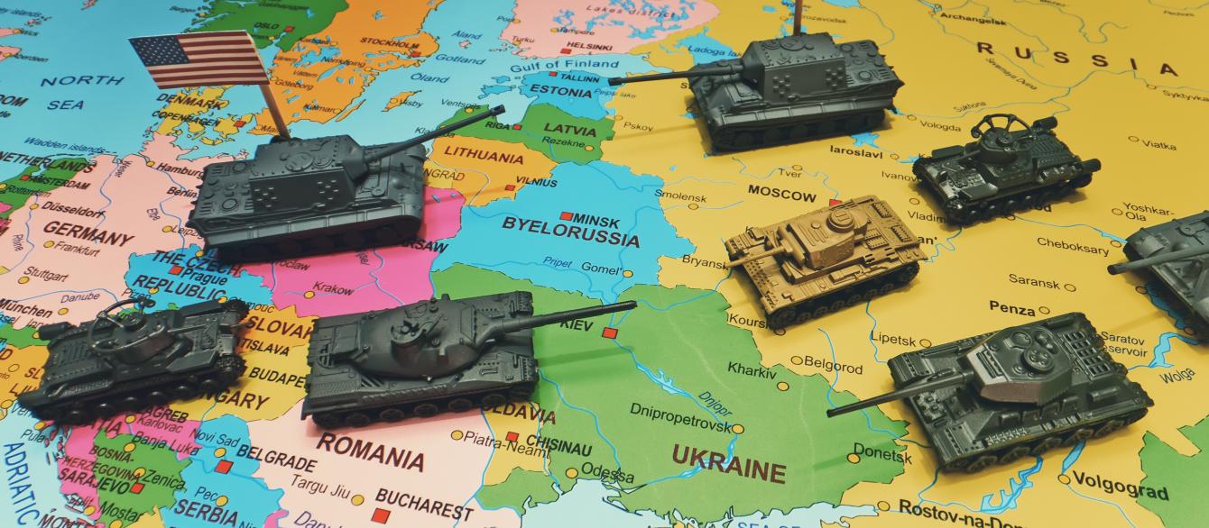 toy tanks on world map