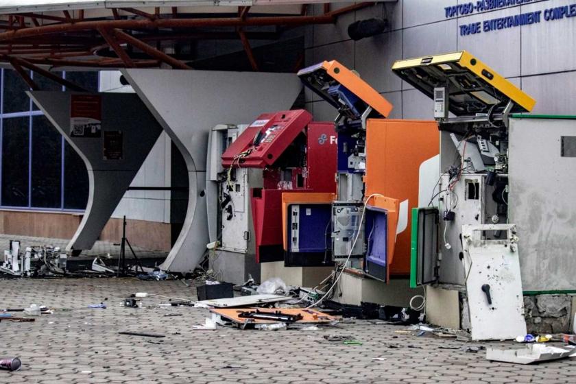 row of destroyed ATM cash machines and payment kiosks in Kazakhstan