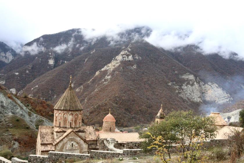 Armenian mountain landscape with an old church in the valley