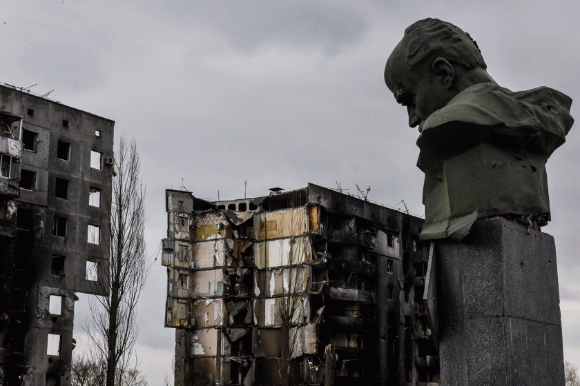 damaged houses by shelling and the head of Lenin, Ukraine