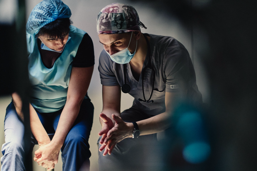 Two medical professionals in a discussion.