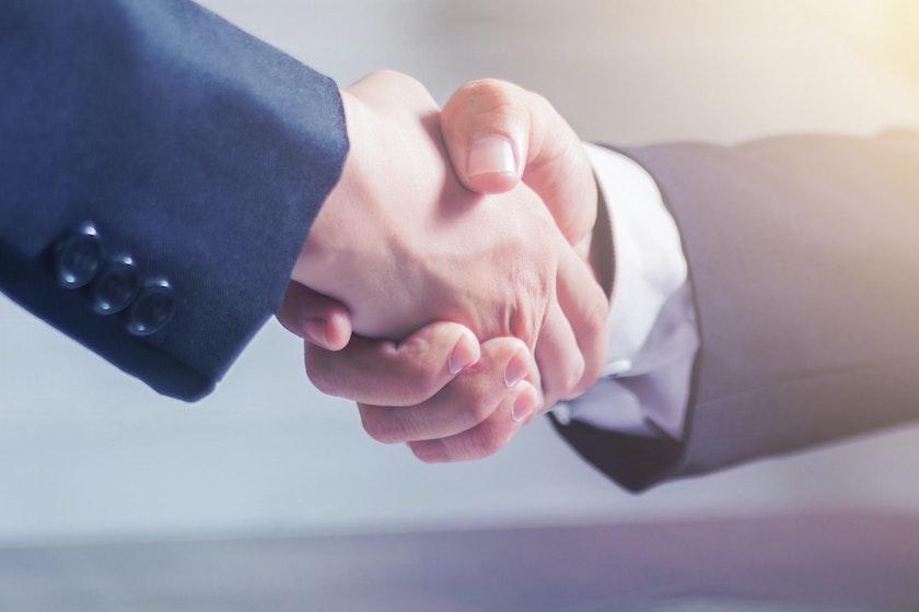 Business deal handshake