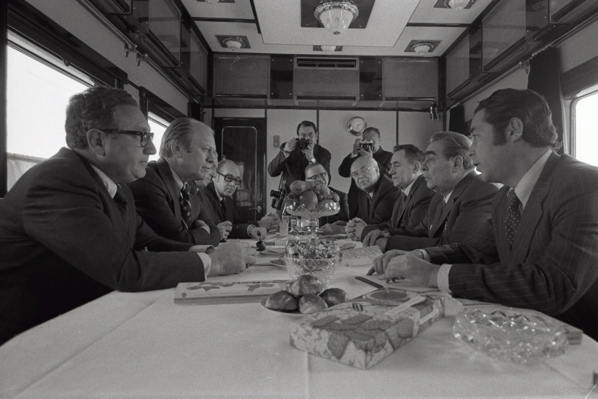 Photograph of President Gerald Ford, Secretary of State Henry Kissinger and Other U.S. Representatives Meeting with Soviet General Secretary Leonid Brezhnev, Foreign Secretary Andrei Gromyko, Soviet Ambassador Anatoly Dobrynin, and Others aboard a Soviet Train Headed for Vladivostok