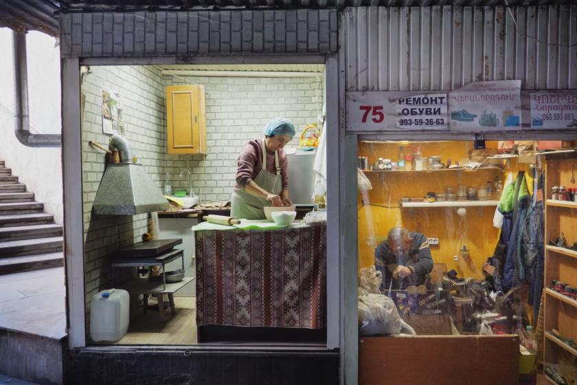 A refugee from Nagorno-Karabakh makes bread in Armenia.