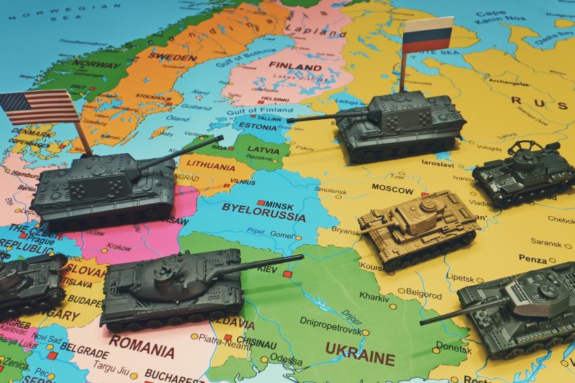 toy tanks on world map