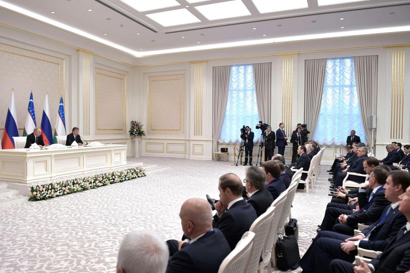 Russias State visit in Uzbekistan, Russian and Uzbek flags, Putin, and delegation