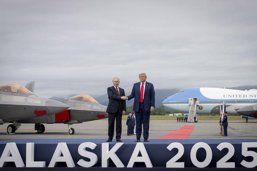 Putin and Trump in Alaska 2025 on the red carpet shaking hands