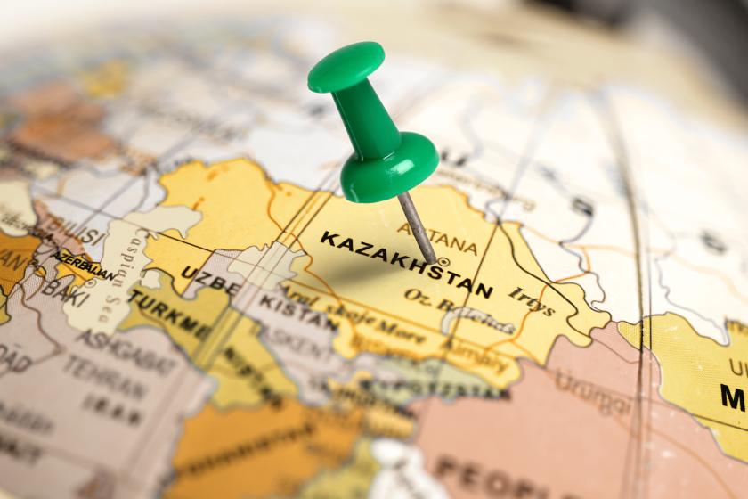 green pin marking Kazakhstan on globe