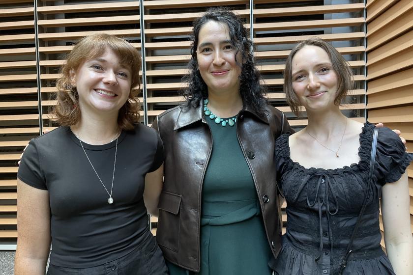 three smiling postdocs